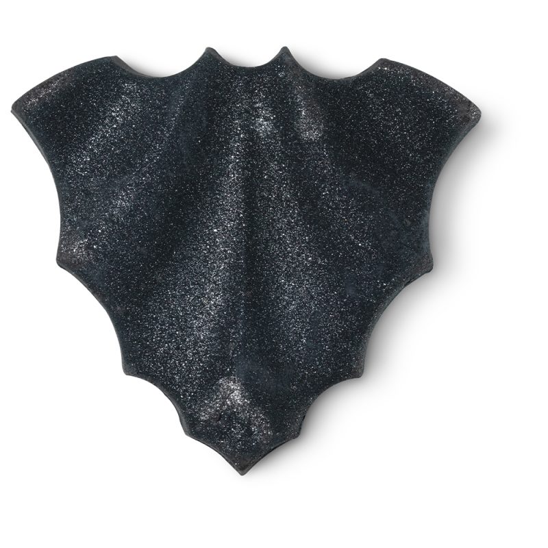 Bat Art bath bomb, sparkly and black in the shape of a bat with its wings outstretched.