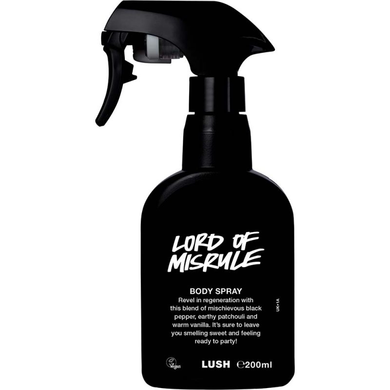 A spray bottle containing Lord of Misrule body spray, made of black Lush plastic.