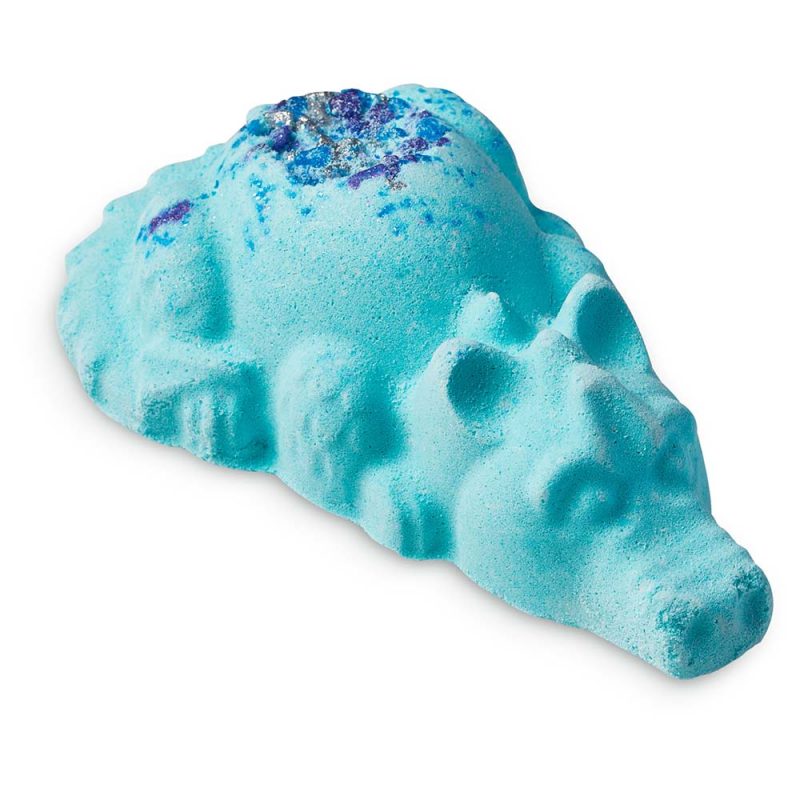 Snow Dragon, a bath bomb in the shape of a dragon sleeping face down with a sprinkling of coloured salt on its back.