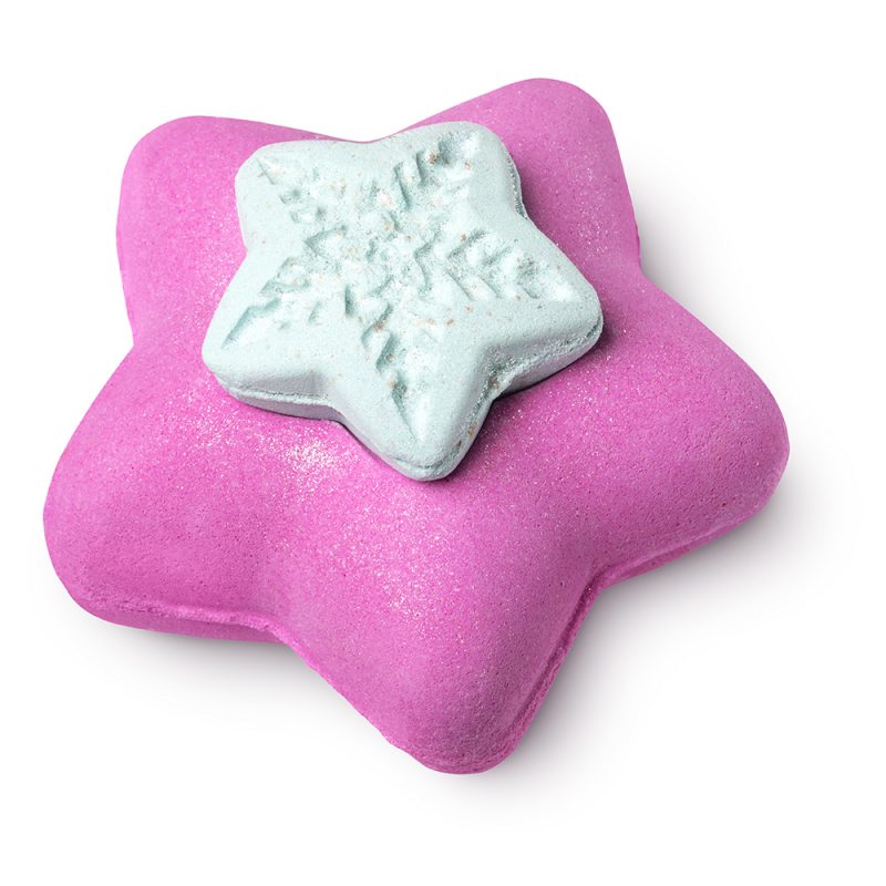 Snow Fairy Lights, a star-shaped pink bath bomb topped by a smaller bath bomb of the same shape but coloured in blue.