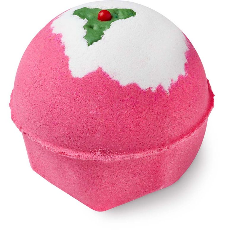 Sweet Pudding, a bright pink bath bomb with a white top reminiscent of a sugar glaze, topped by holly decorations.