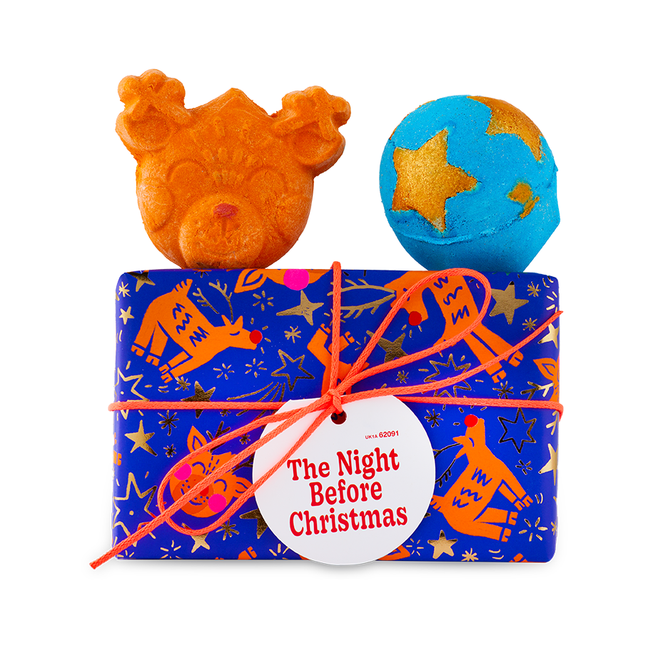 The night before Christmas gift box pictured with its contents, Reindeer bubble bar and shoot for the stars bath bombs on top